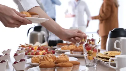 event attendees at a breakfast buffet